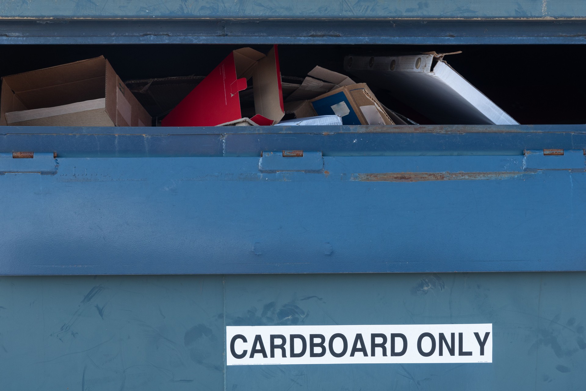 Blue, public, cardboard only recycling bin.